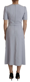 Robe midi en viscose bleue avec appliqués floraux Dolce & Gabbana, style élégant et féminin.
