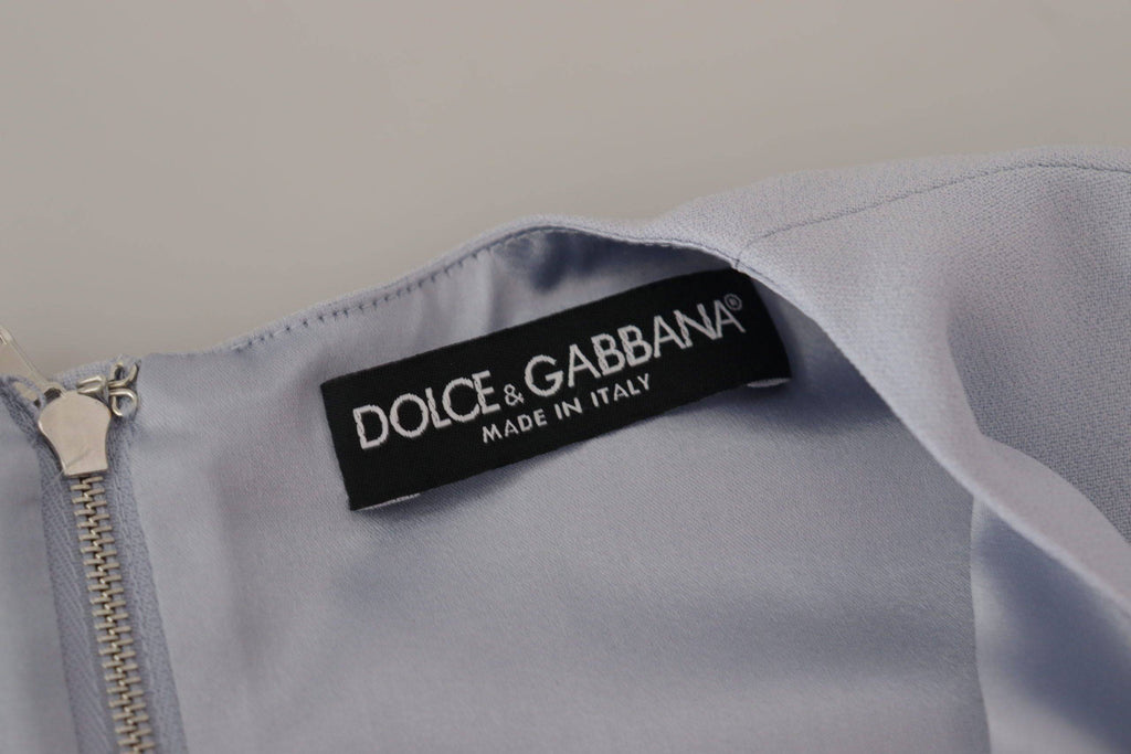 Robe midi en viscose bleue à appliqué floral Dolce & Gabbana, élégante et fluide, avec détails floraux colorés.