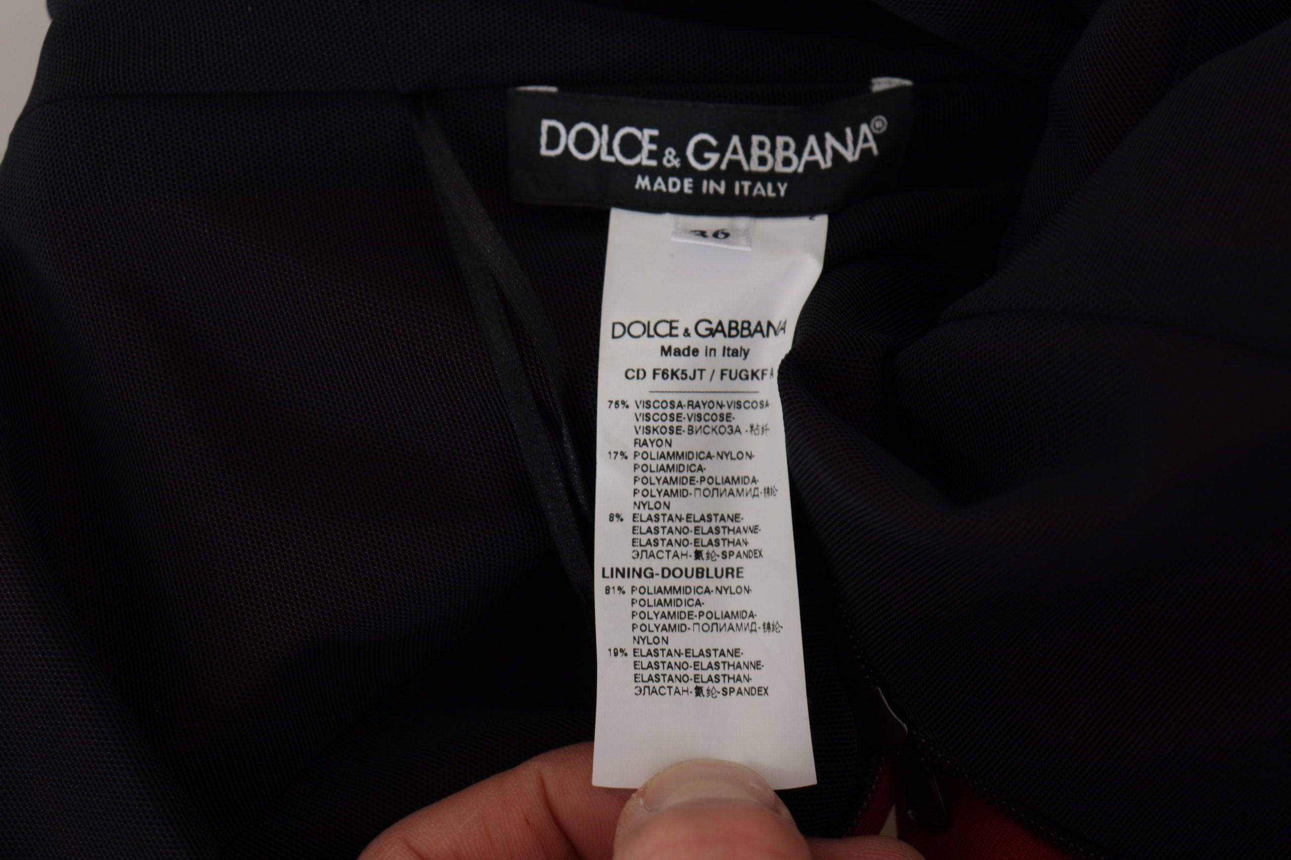 Robes midi rouge Dolce & Gabbana à col en cœur, coupe moulante et élégante, idéale pour une allure sophistiquée.