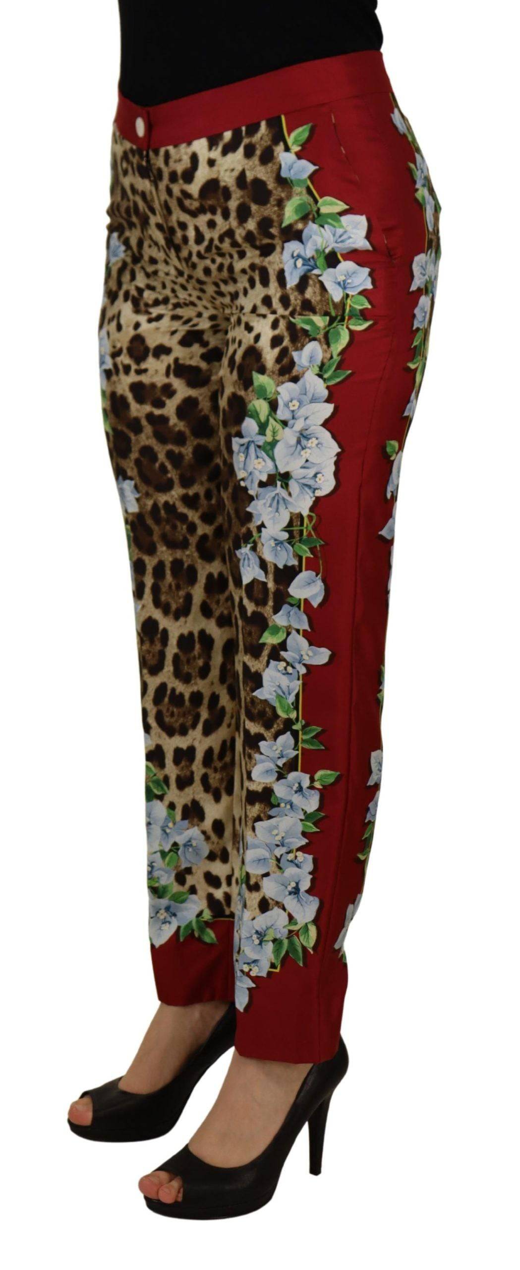 Pantalon Dolce & Gabbana à motif léopard multicolore et fleurs, coupe mi-haute, tissu fluide, style élégant et tendance.
