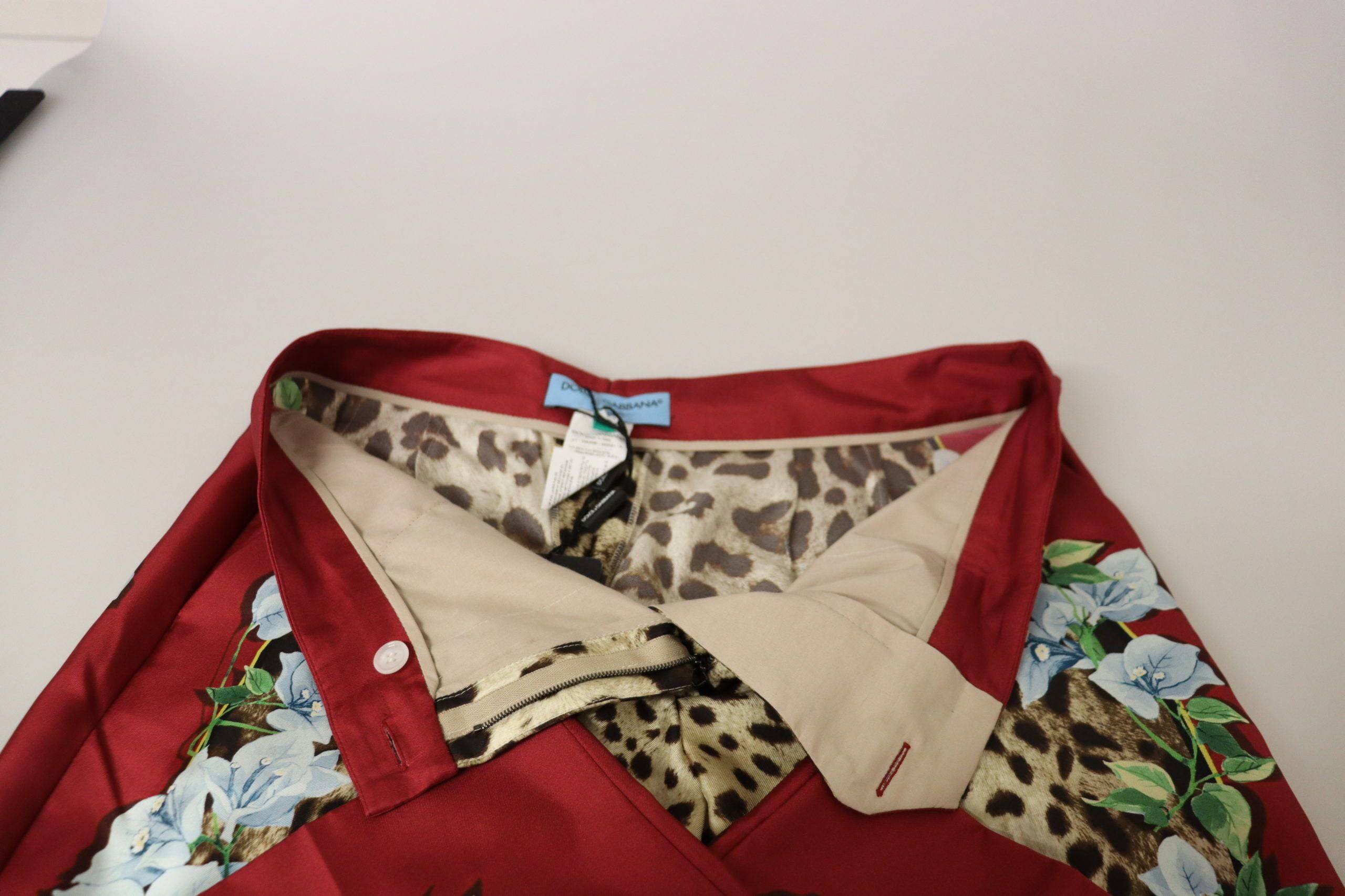 Pantalon Dolce & Gabbana à taille moyenne avec imprimé léopard multicolore et motif floral, coupe élégante et tendance.