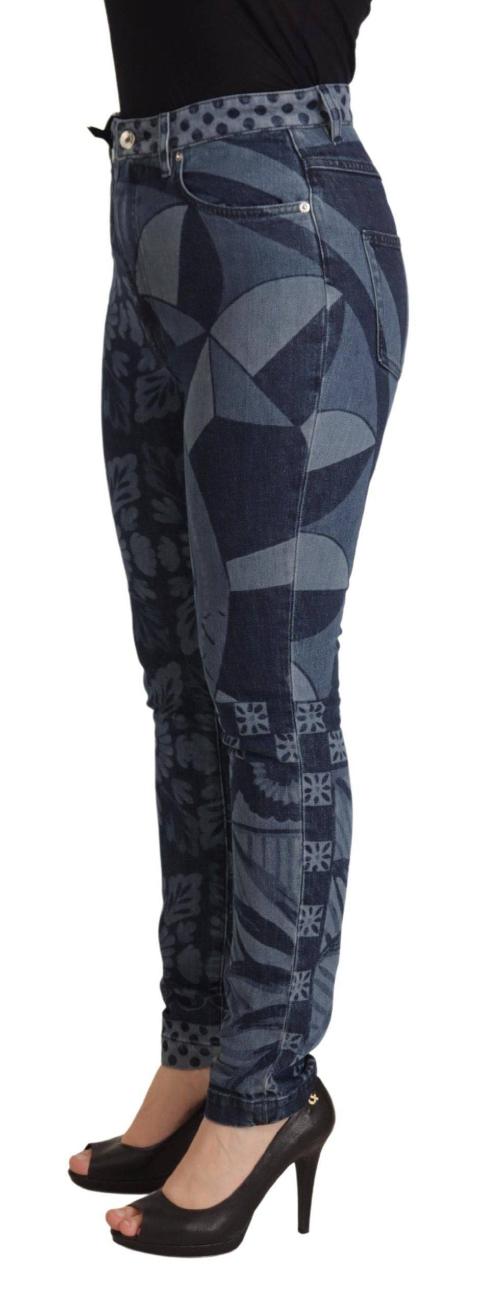 Jeans slim taille haute Dolce & Gabbana en denim bleu à fleurs, montrant la coupe ajustée et les détails floraux.