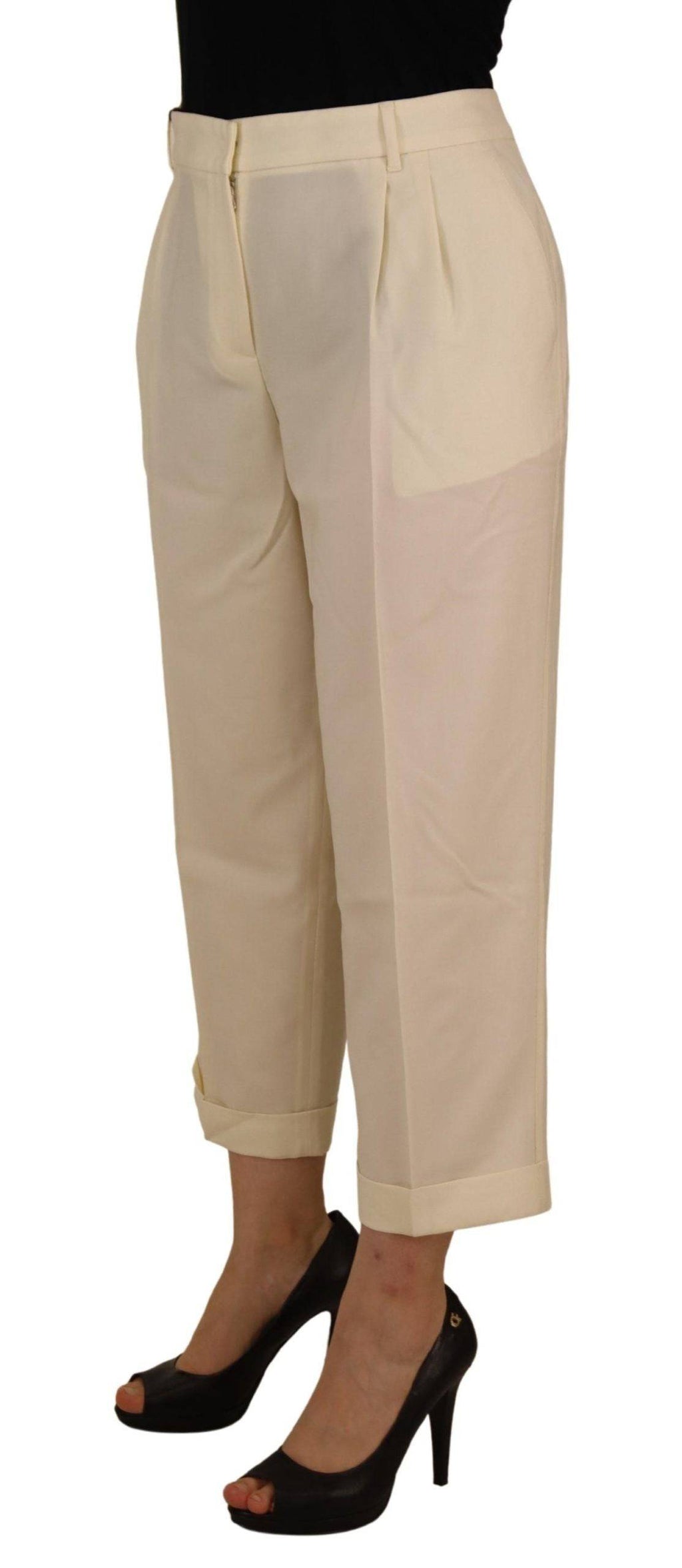 Pantalon Dolce & Gabbana ivoire à taille haute, coupe cropped avec ourlet plié, style élégant et moderne.