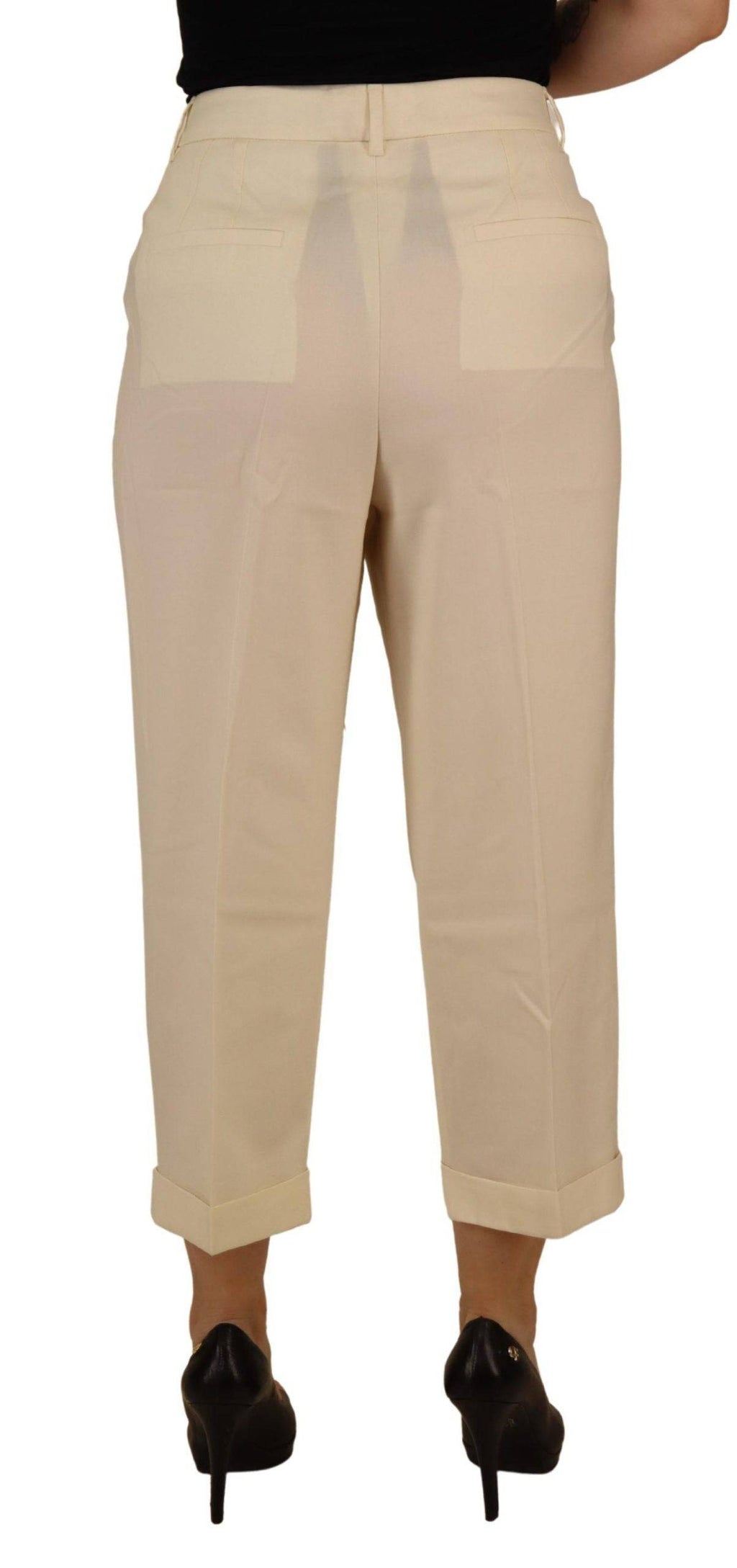 Pantalons Dolce & Gabbana ivoire à taille haute, coupe cropped et ourlet plissé, mode élégante et sophistiquée.