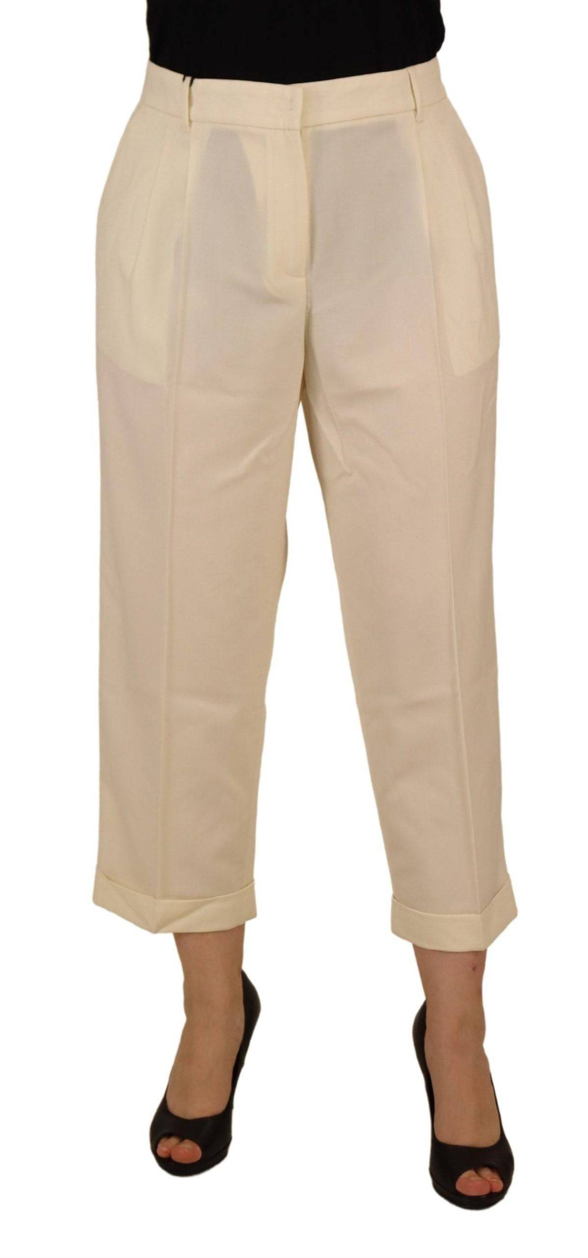 Pantalon Dolce & Gabbana ivoire à taille haute, coupe cropped avec ourlet plissé, style élégant et moderne pour femme.