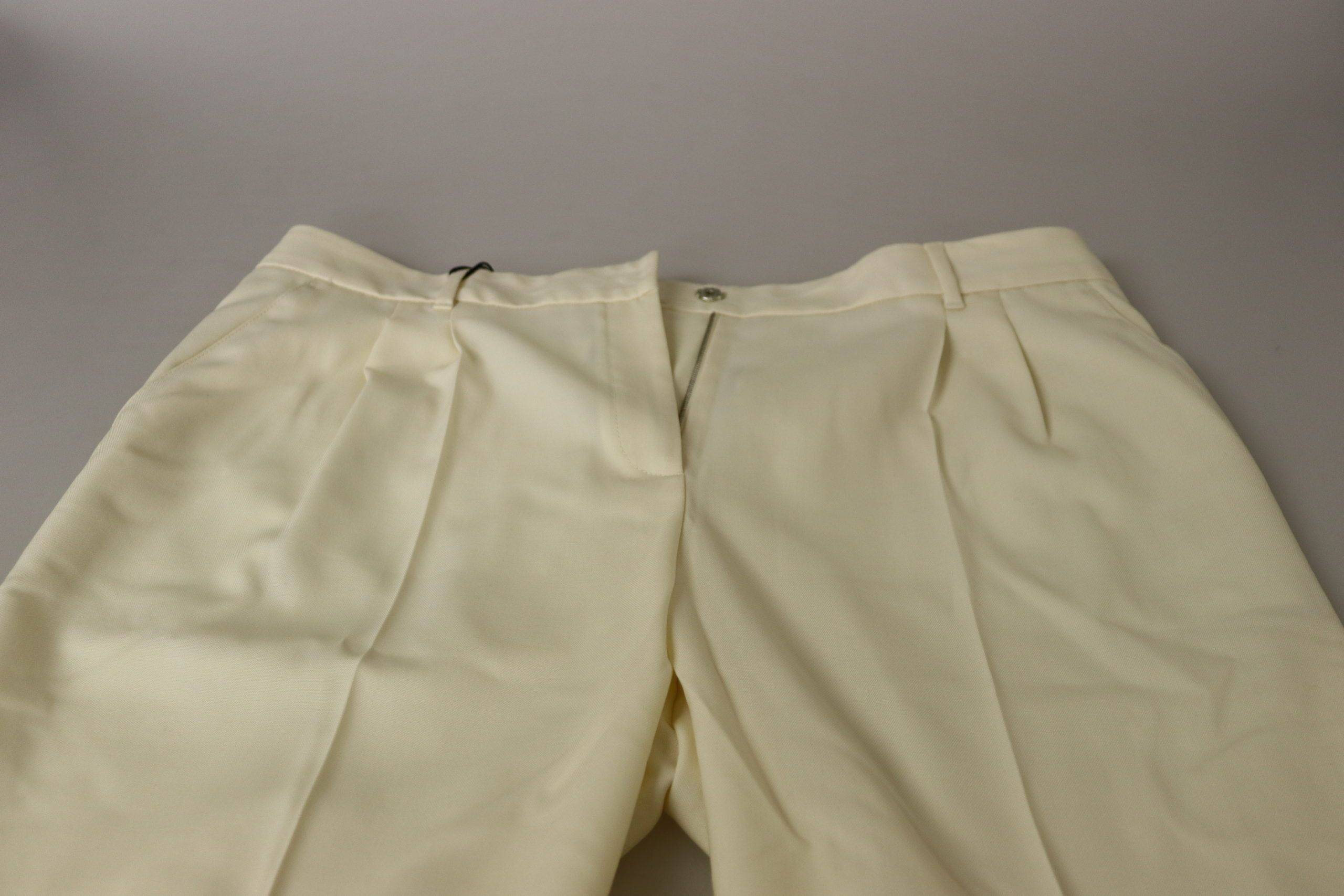Pantalons Dolce & Gabbana ivoire à taille haute, coupe cropped, ourlet plissé, style chic et élégant, vue de face