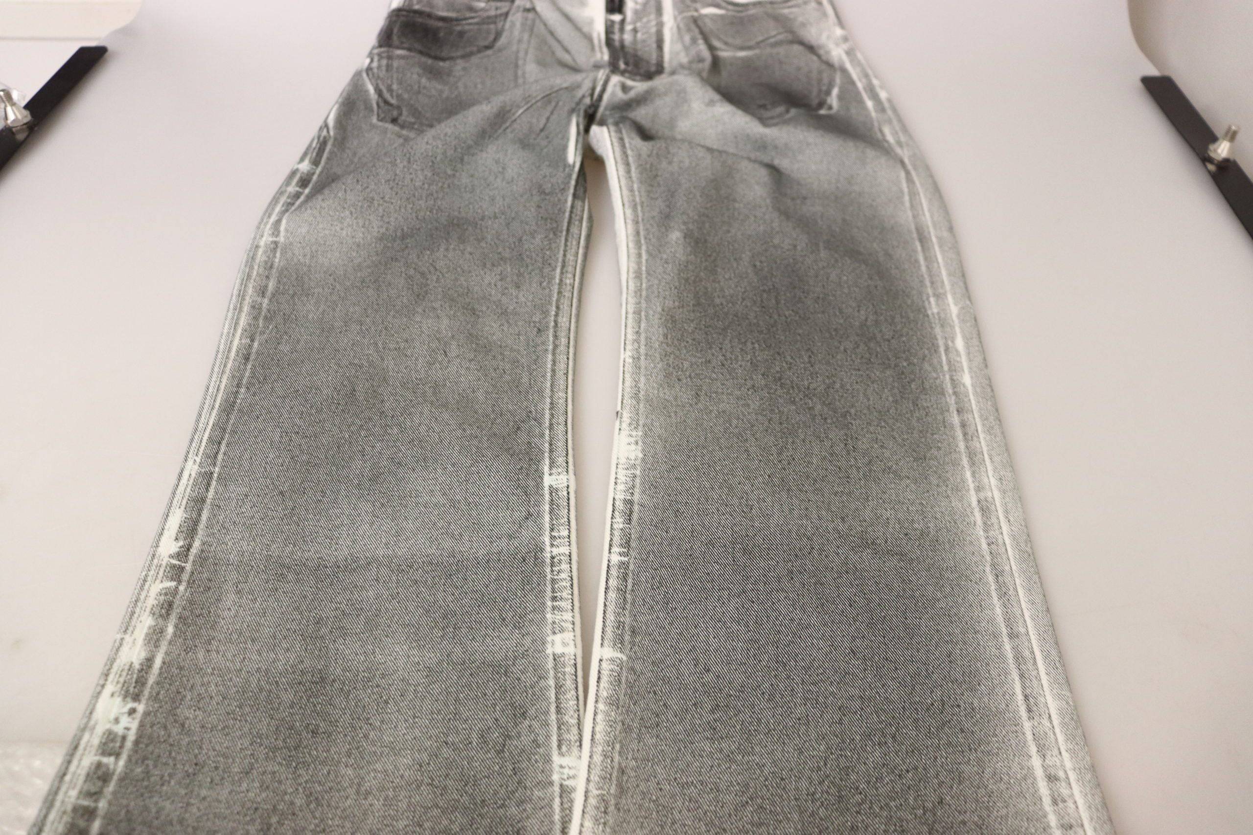 Pantalons en jean en coton gris délavé à taille haute de Dolce & Gabbana, style décontracté et tendance.