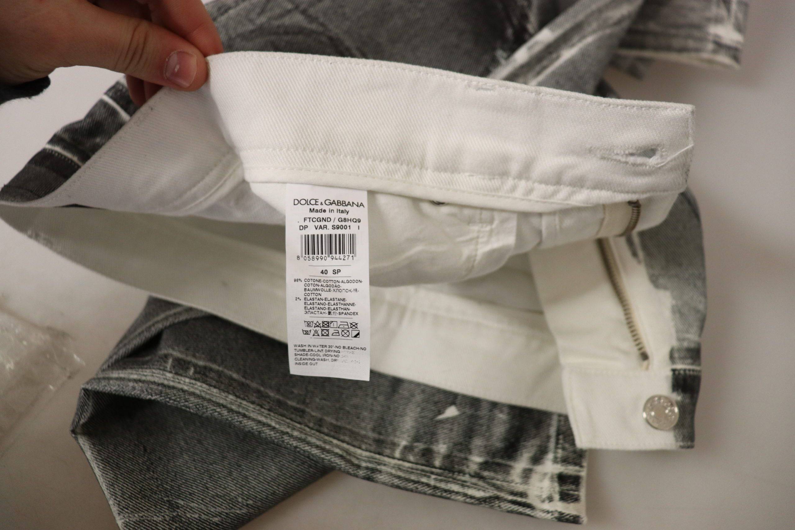 Pantalon en denim gris délavé à taille haute Dolce & Gabbana, en coton, style jeans pour femme.