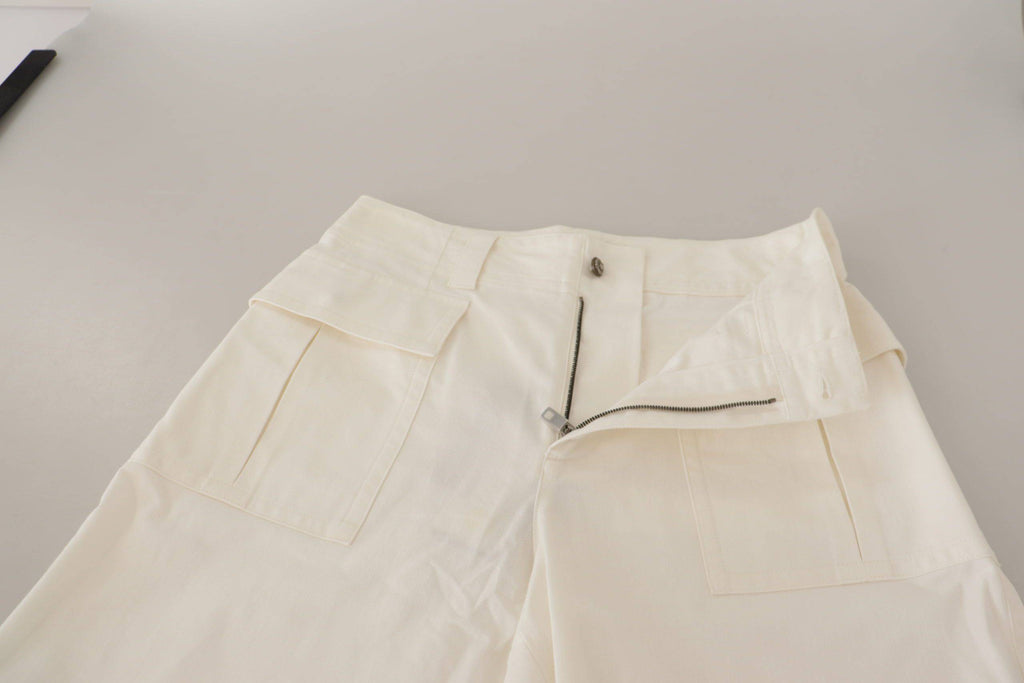 Pantalons en coton blancs Dolce & Gabbana à taille haute et coupe tapered pour femmes, vue de face sur un fond neutre.