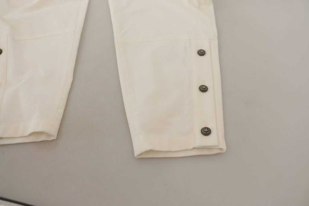 Pantalons pour femmes Dolce & Gabbana en coton blanc taille haute et coupe tapered, vues de face sur fond blanc
