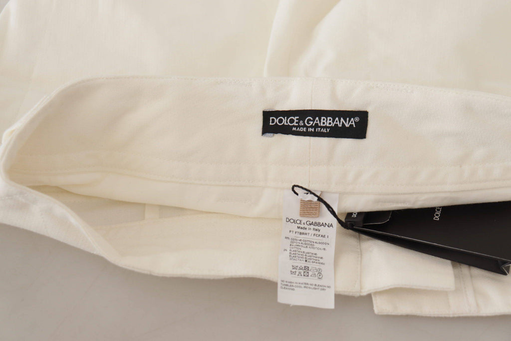 Pantalons pour femmes Dolce & Gabbana en coton blanc à taille haute et coupe tapered, visibles sur l'image.