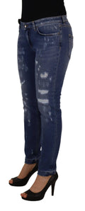 Jeans en denim skinny bleu Dolce & Gabbana en coton lavé, taille basse et coupe ajustée, visible à l'image.