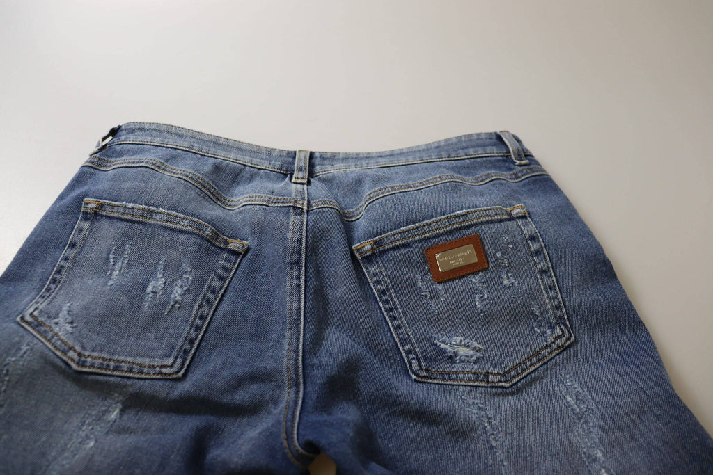 Jeans skinny en coton lavé bleu de Dolce & Gabbana, taille basse, look décontracté, devant avec fermeture éclair et poches avant.