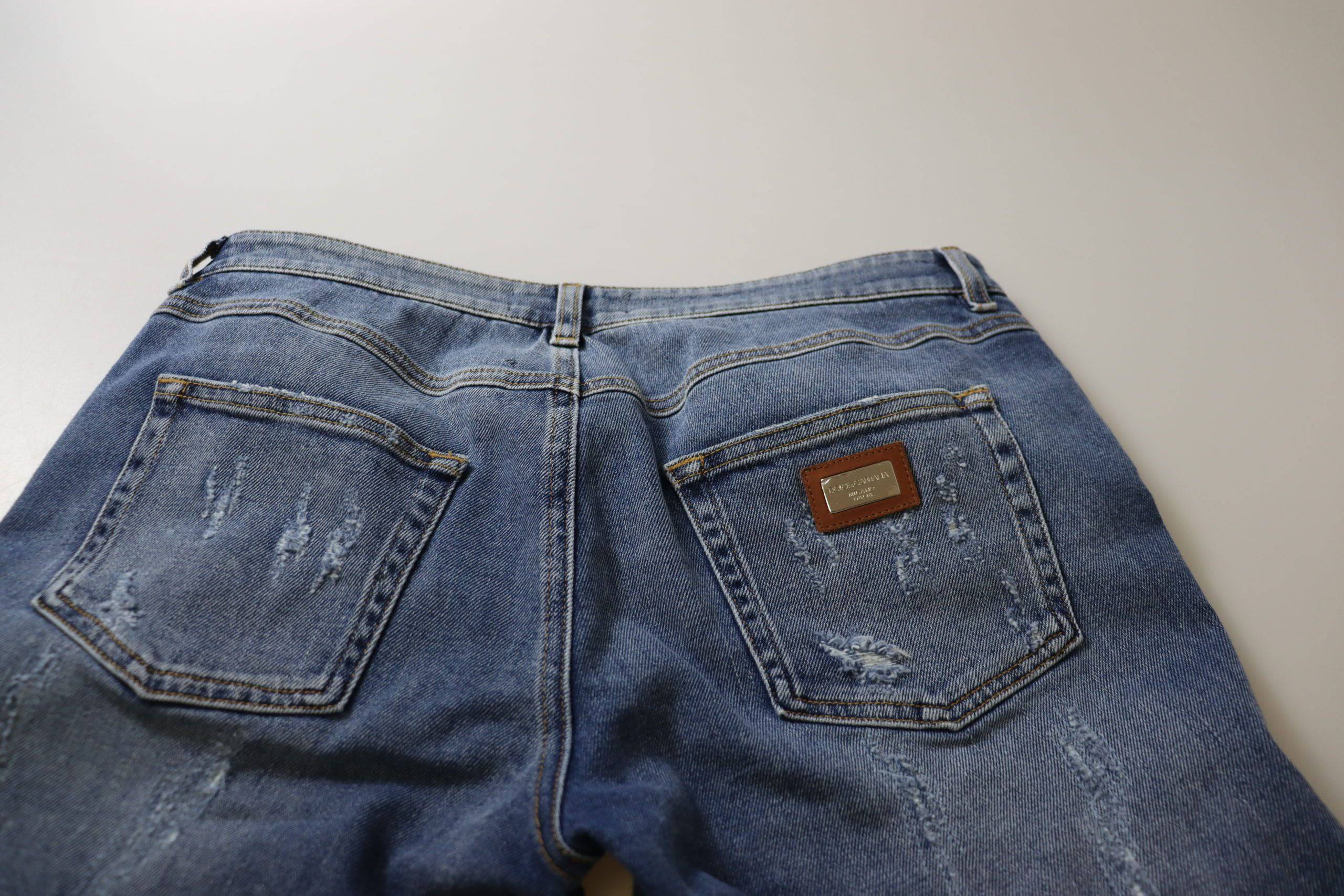Jeans skinny en coton lavé bleu de Dolce & Gabbana, taille basse, look décontracté, devant avec fermeture éclair et poches avant.