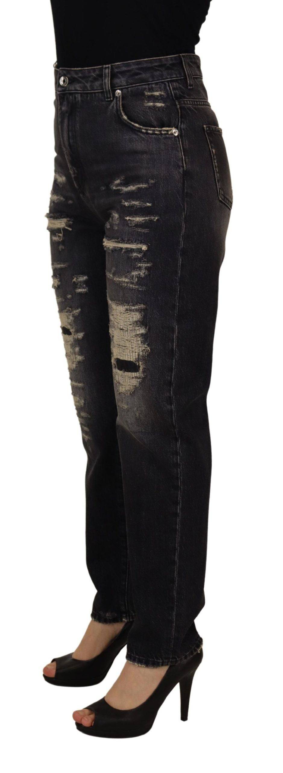 Jeans en denim noir délavé et déchiré à la taille haute de Dolce & Gabbana, style décontracté et tendance.