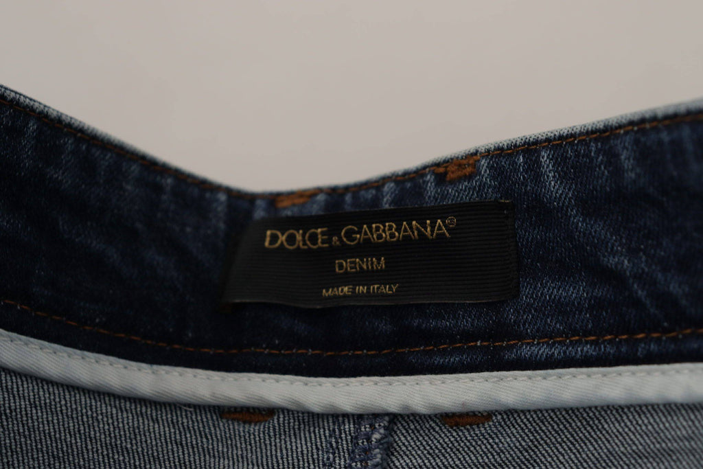 Pantalons en jean en denim bleu Dolce & Gabbana avec embellissements en cristal, style élégant et tendance.