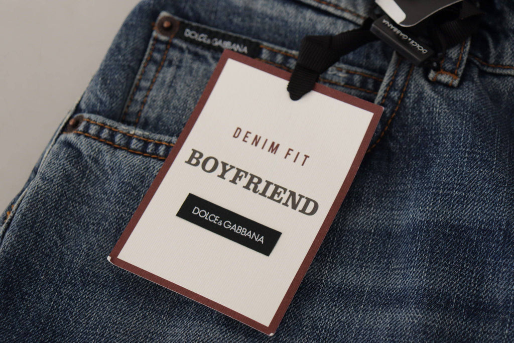 Jeans Dolce & Gabbana en denim bleu avec patch cœur baroque et logo, coupe classique pour homme ou femme.