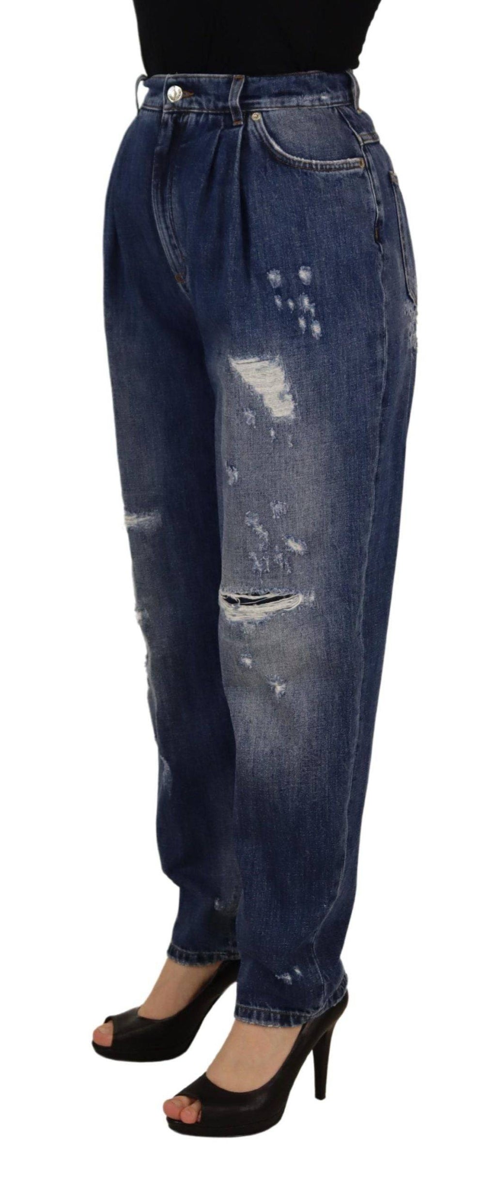 Pantalon bleu délavé à taille haute et coupe ample de Dolce & Gabbana, vue de face sur fond blanc.