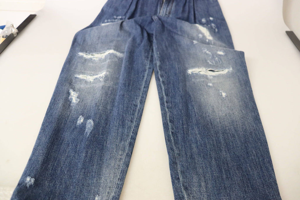 Pantalon ample taille haute en denim bleu délavé de Dolce & Gabbana, style décontracté et moderne.