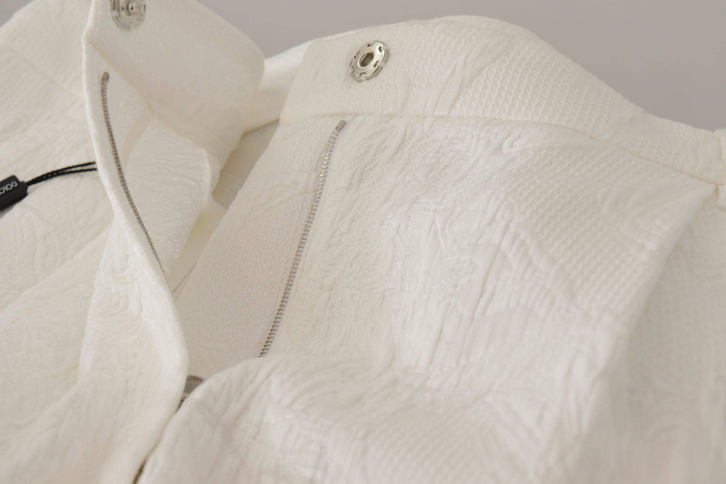 Shorts en coton blanc Dolce & Gabbana, culotte taille haute, vue de face sur un fond neutre.