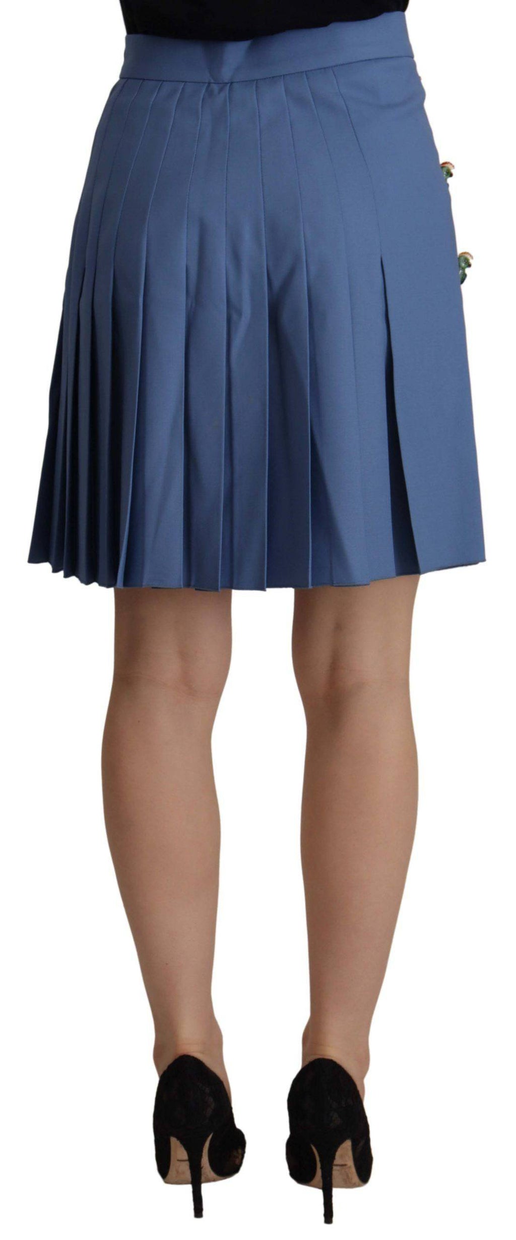 Jupe courte plissée en laine bleue Dolce & Gabbana ornée de détails embellis, élégante et sophistiquée.