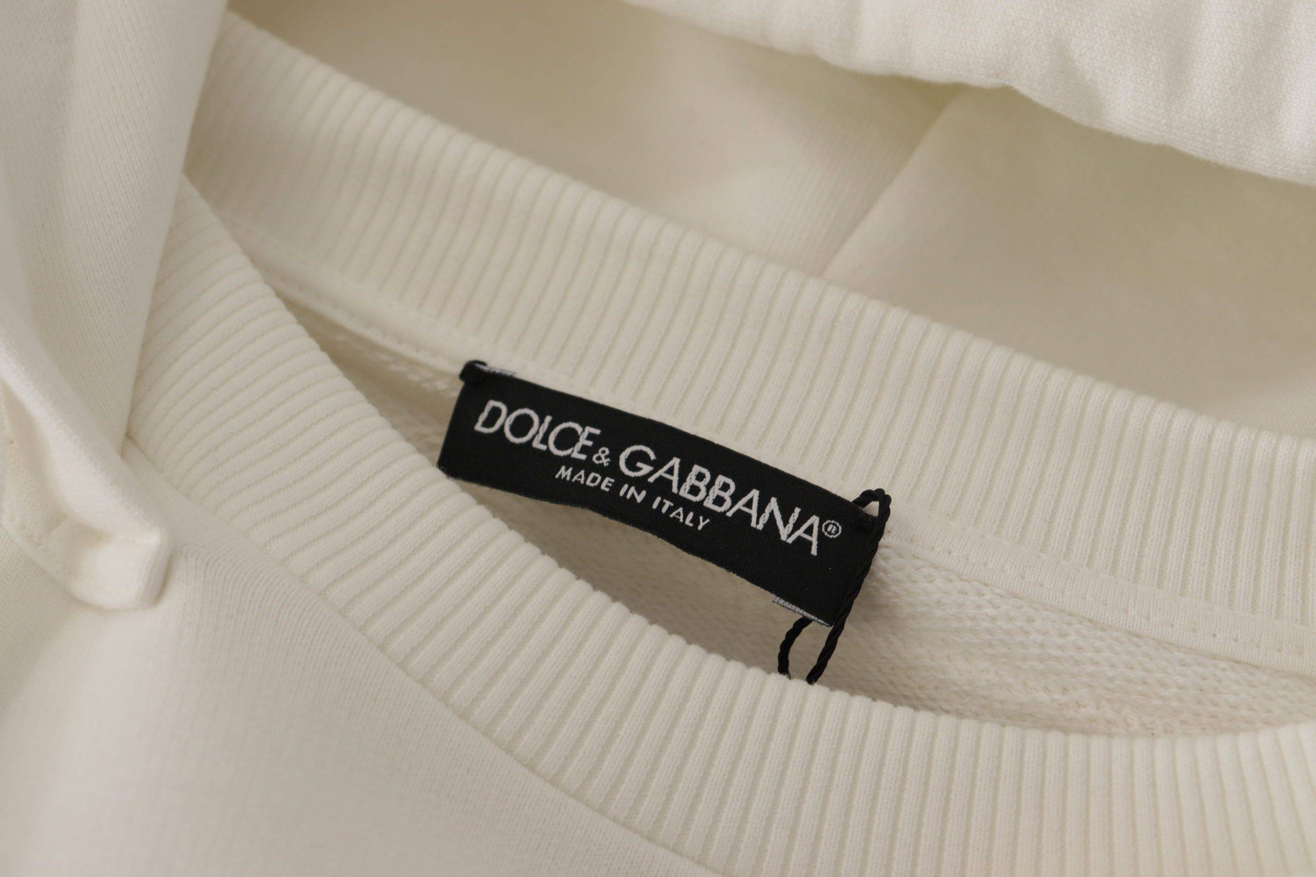 Sweat à capuche blanc Dolce & Gabbana avec broderies, pull-over confortable et élégant pour homme ou femme.
