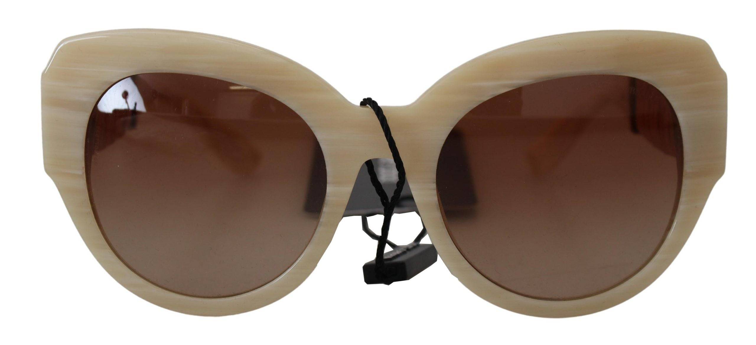 Lunettes de soleil Dolce & Gabbana DG4294 en acétate beige avec monture pleine rim et verres bruns.