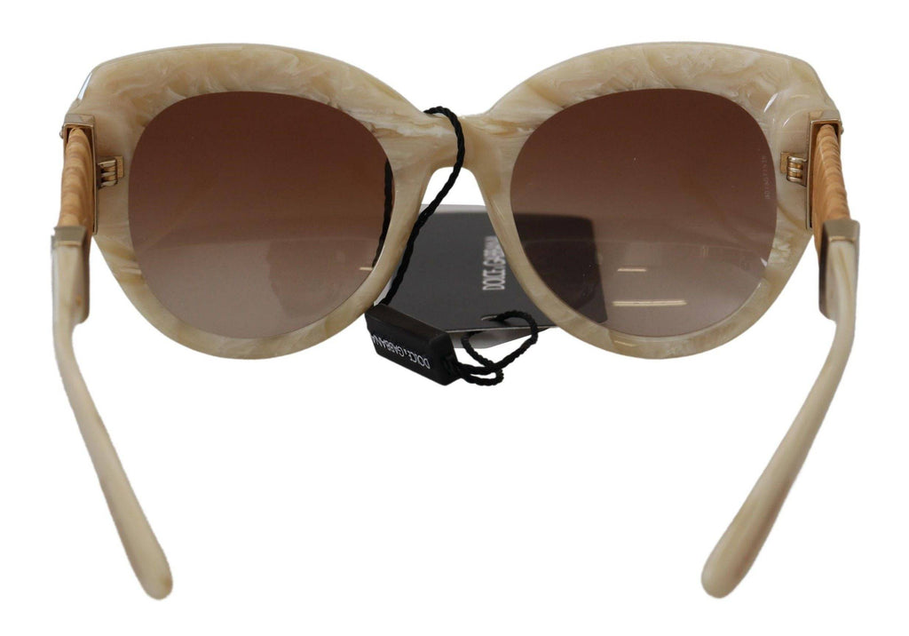 Lunettes de soleil Dolce & Gabbana DG4294 avec monture en acétate beige et verres marron, style plein cadre.