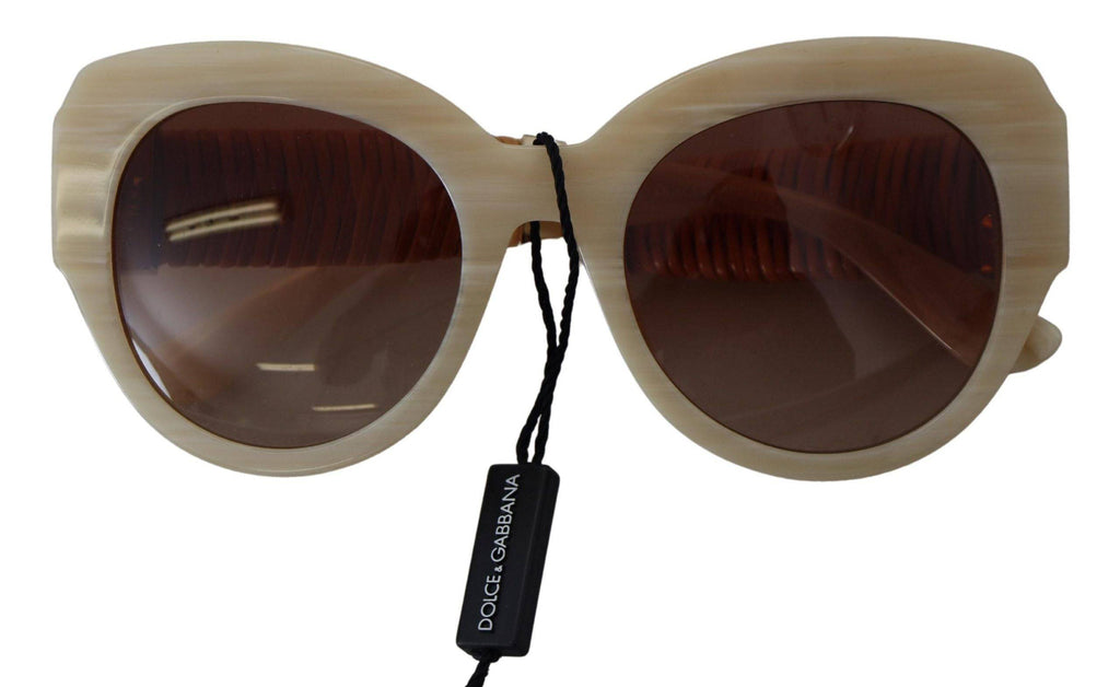 Lunettes de soleil Dolce & Gabbana DG4294 avec monture en acétate beige et verres marron, style élégant et moderne.