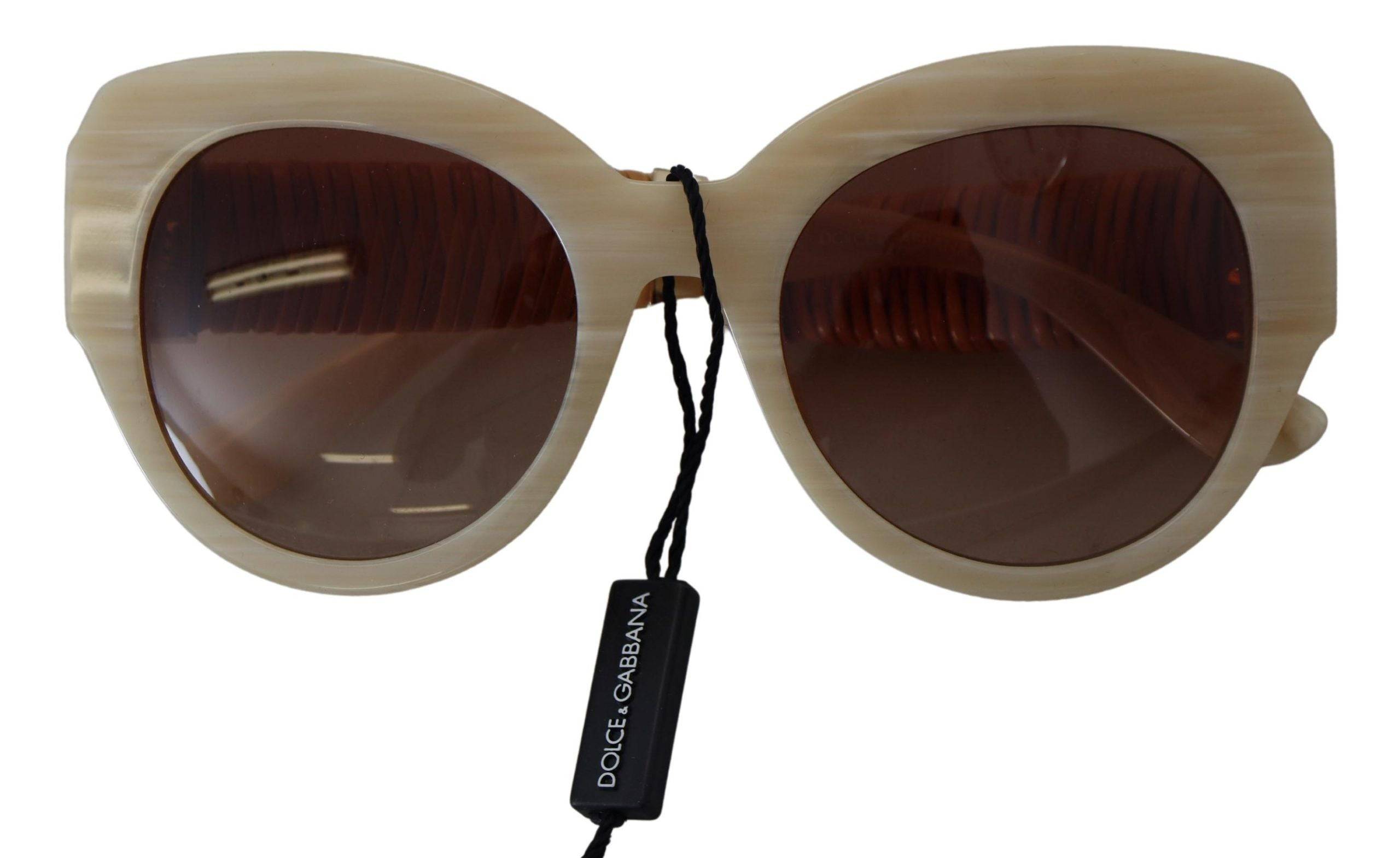 Lunettes de soleil Dolce & Gabbana DG4294 avec monture en acétate beige et verres marron, style élégant et moderne.