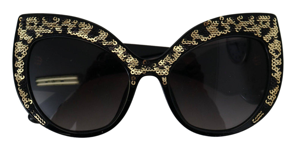 Lunettes de soleil Dolce & Gabbana DG4326 avec monture noire, détails en sequins dorés et ailes de papillon, verres polarisés.