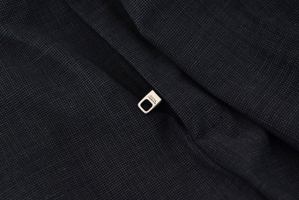 Pantalon cargo gris à carreaux de Dolce & Gabbana, pantalon stretch décontracté avec poches utilitaires, style moderne et élégant.