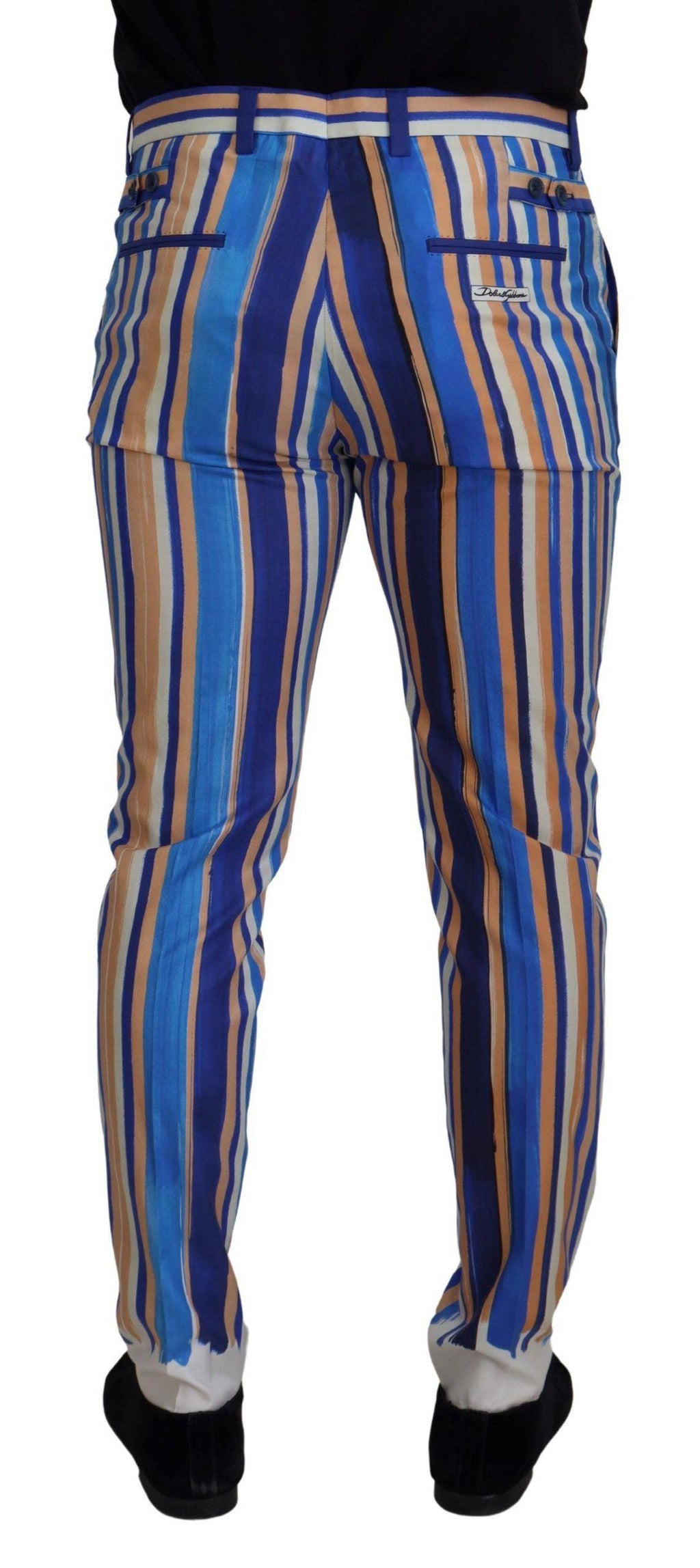 Pantalons slim en coton et soie à rayures bleues de Dolce & Gabbana, vue de face sur fond blanc.