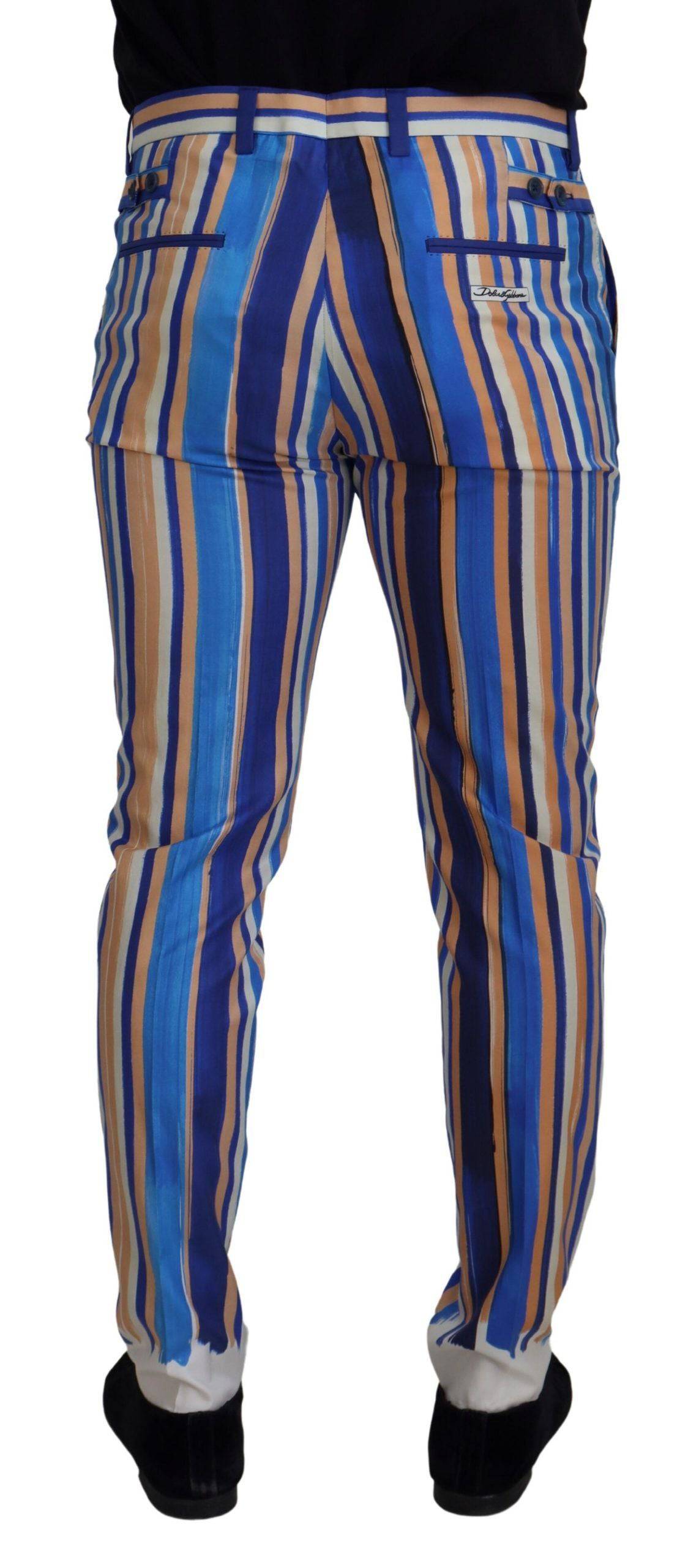 Pantalons slim en coton et soie à rayures bleues de Dolce & Gabbana, vue de face sur fond blanc.