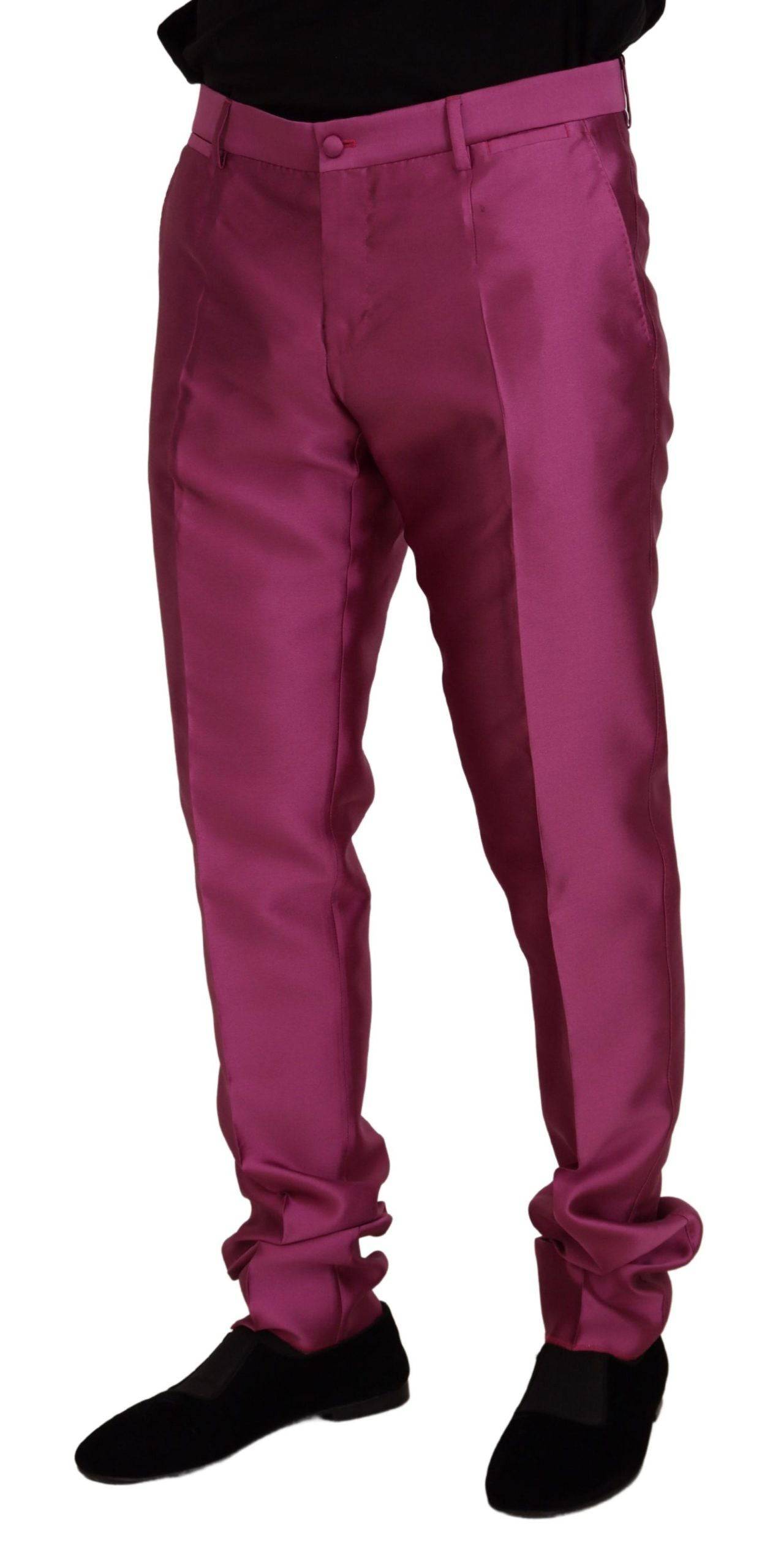 Pantalon slim en soie rose de la marque Dolce & Gabbana, pantalon élégant pour occasion formelle.