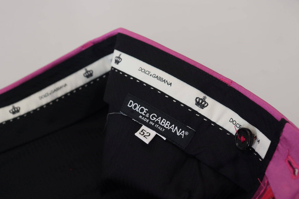 Pantalon élégant en soie rose Dolce & Gabbana, pantalon slim formel pour femme, vue front avec détails sophistiqués.