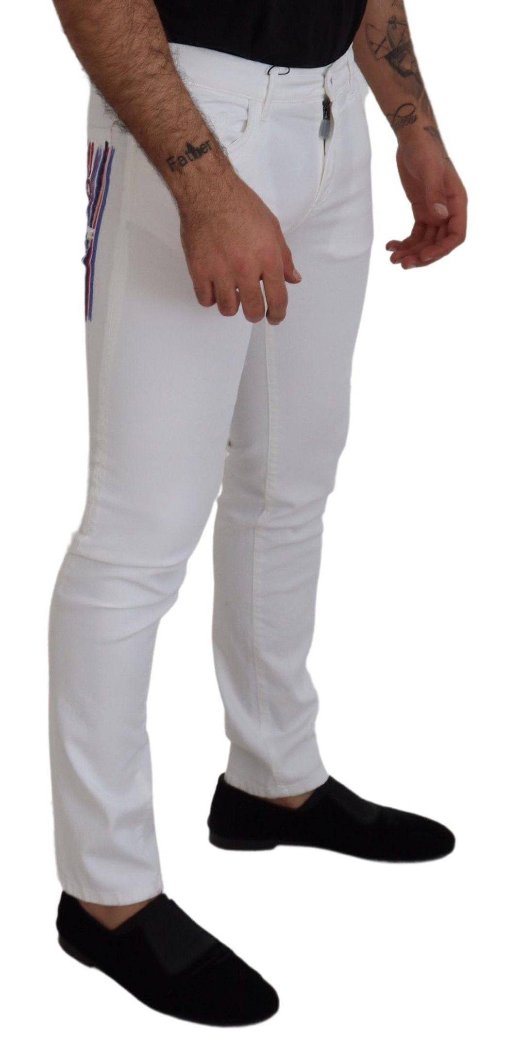 Pantalon en jean blanc Dolce & Gabbana slim, skinny, en coton extensible, vue de face sur un fond neutre.