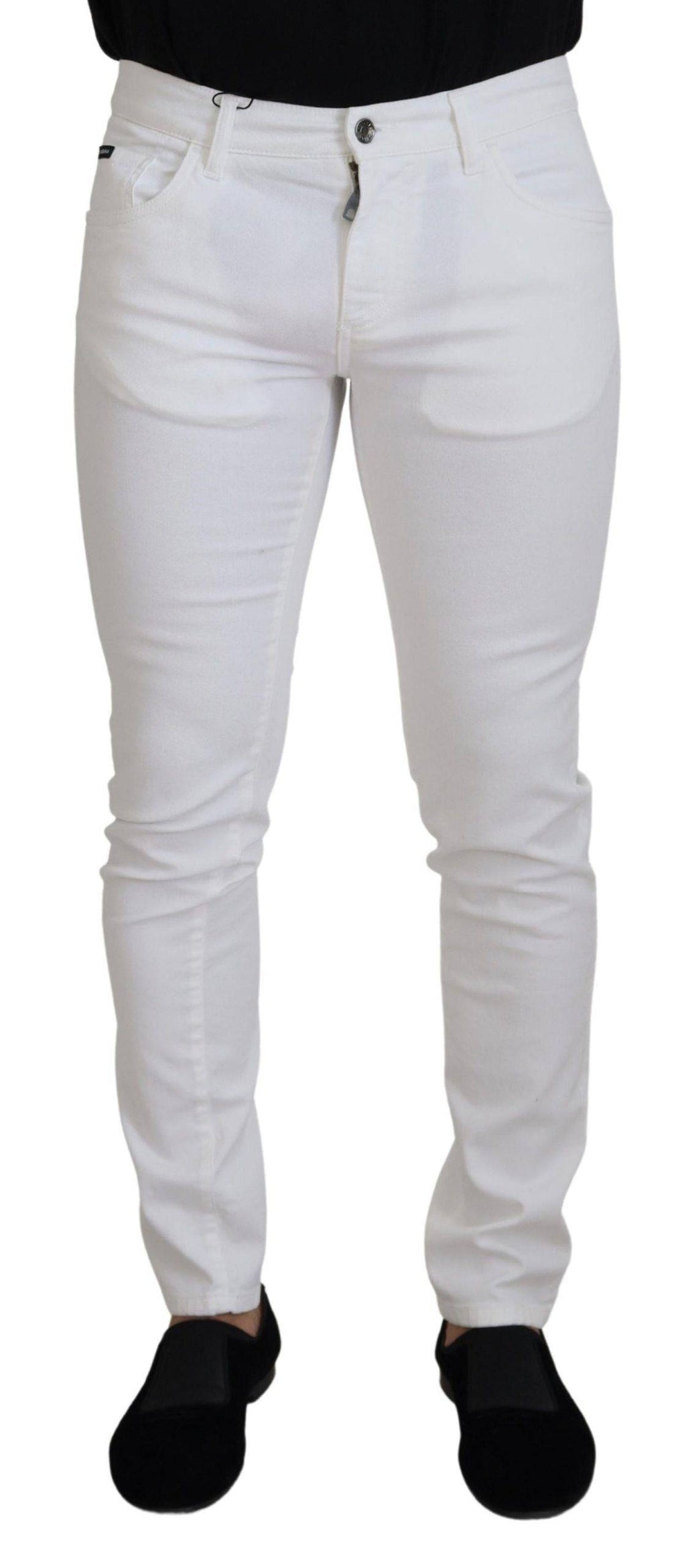 Jeans skinny slim blanc en coton extensible de Dolce & Gabbana, coupe ajustée et tissu stretch pour un style élégant et confortable.