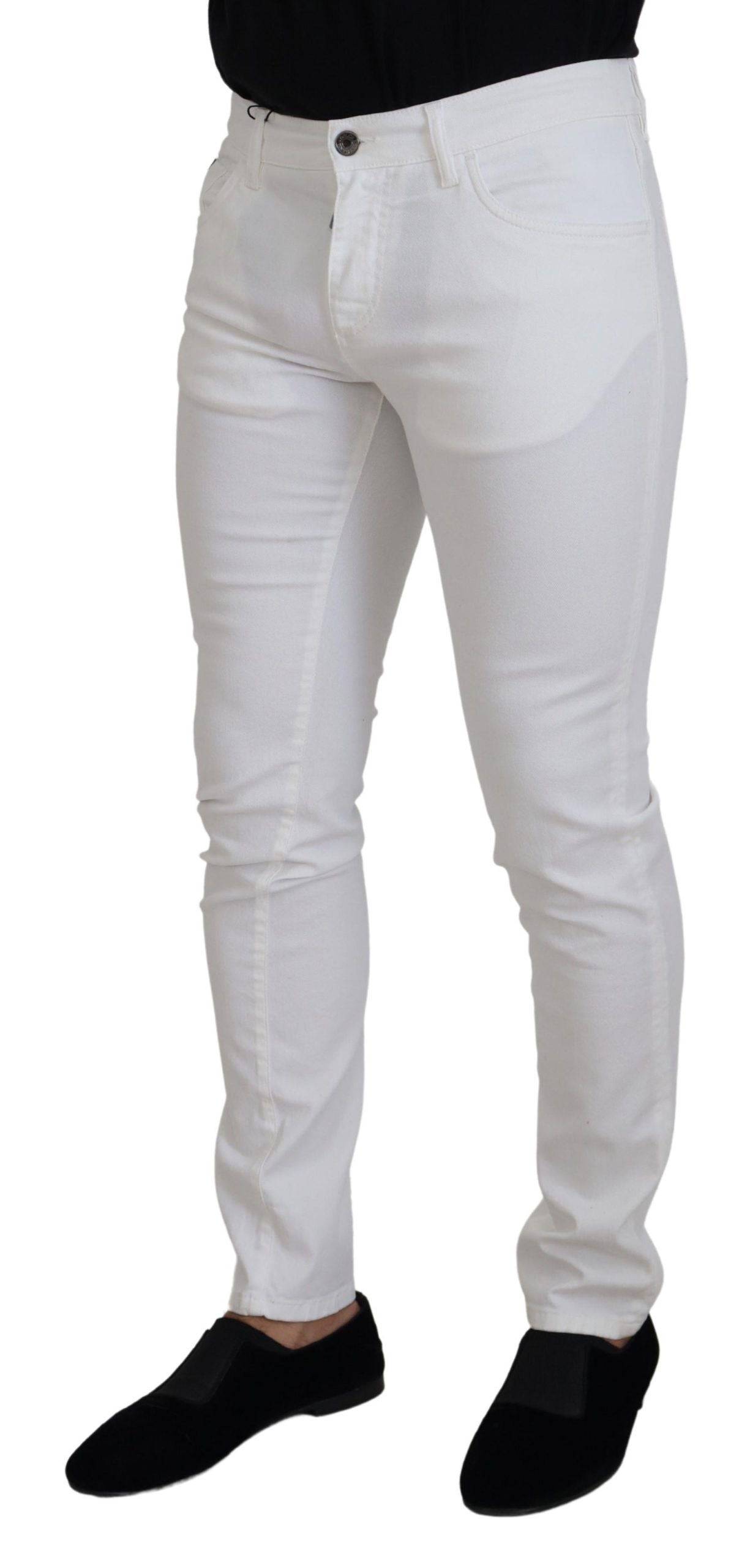 Jeans slim skinny en coton stretch blanc de Dolce & Gabbana, coupe ajustée et moderne, visibles en image.