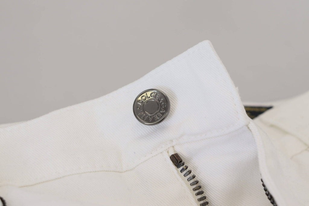Jeans slim skinny en denim coton stretch blanc de Dolce & Gabbana, coupe ajustée et moderne, visible en gros plan.