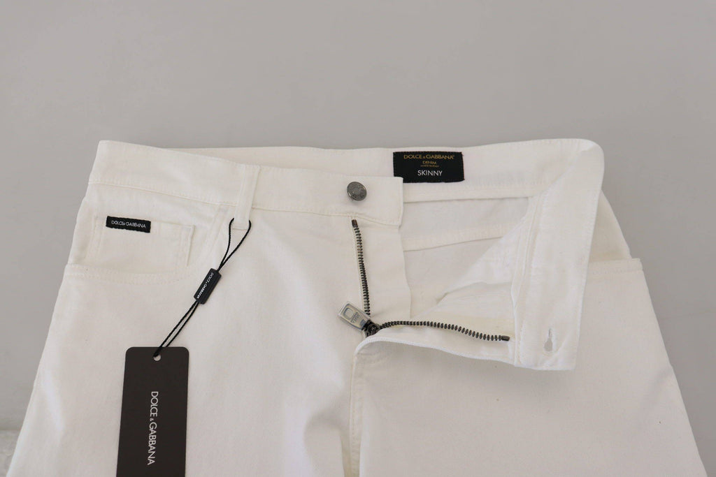 Jeans slim skinny en coton stretch blanc de Dolce & Gabbana, coupe ajustée et moderne, pour un style élégant.