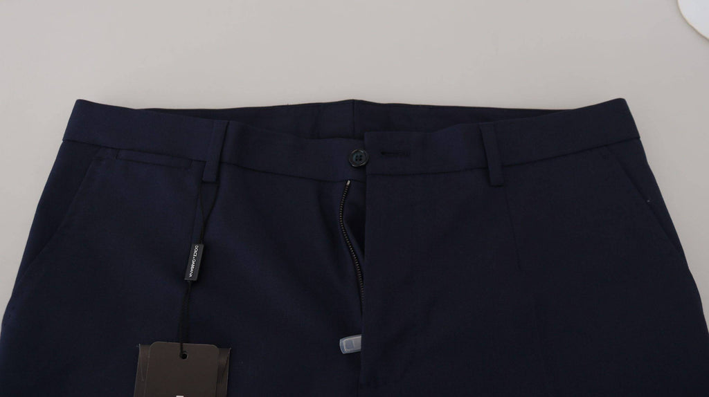 Pantalons slim en coton et lin bleu de Dolce & Gabbana, style chino, vue de face sur un fond neutre.