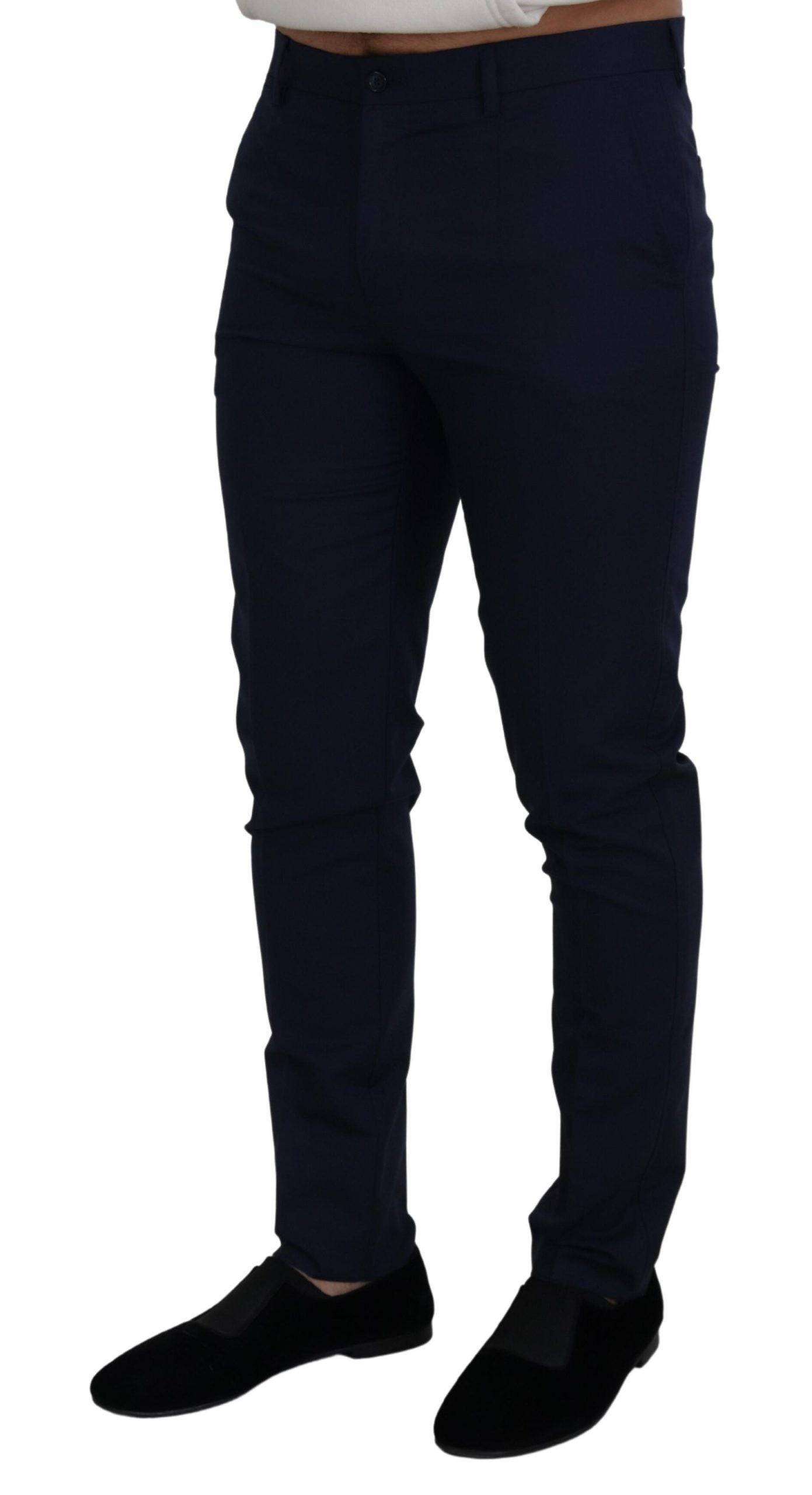 Pantalons slim en lin et coton bleu Dolce & Gabbana, chinos élégants avec coupe ajustée et détails modernes.