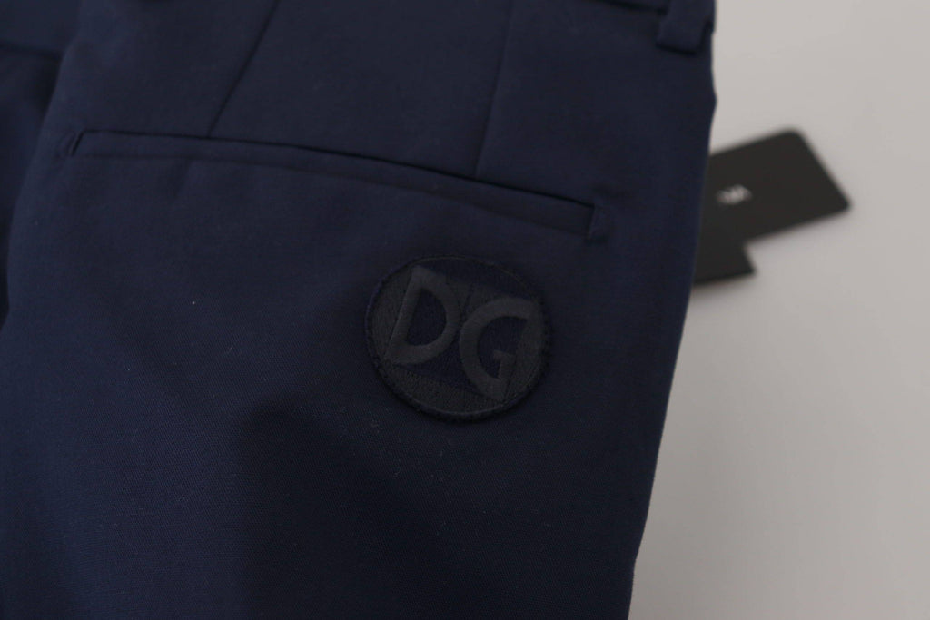 Pantalons chinos en lin et coton bleu Dolce & Gabbana, coupe slim, vue de face avec détails de la texture du tissu.