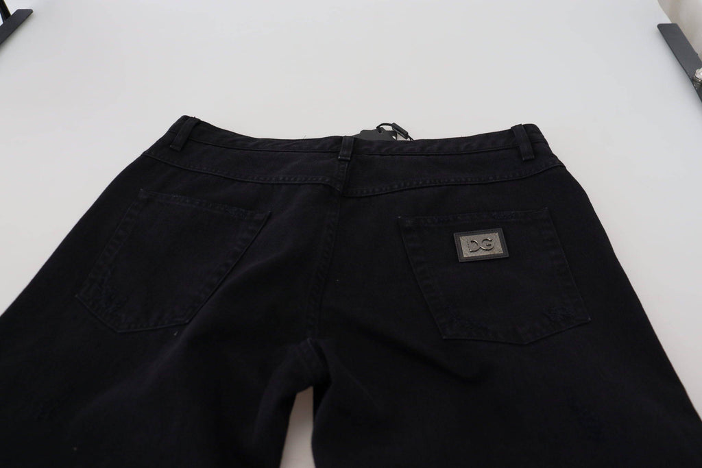 Jeans en coton noir Dolce & Gabbana, coupe ample et décontractée, avec des déchirures et un style tendance.