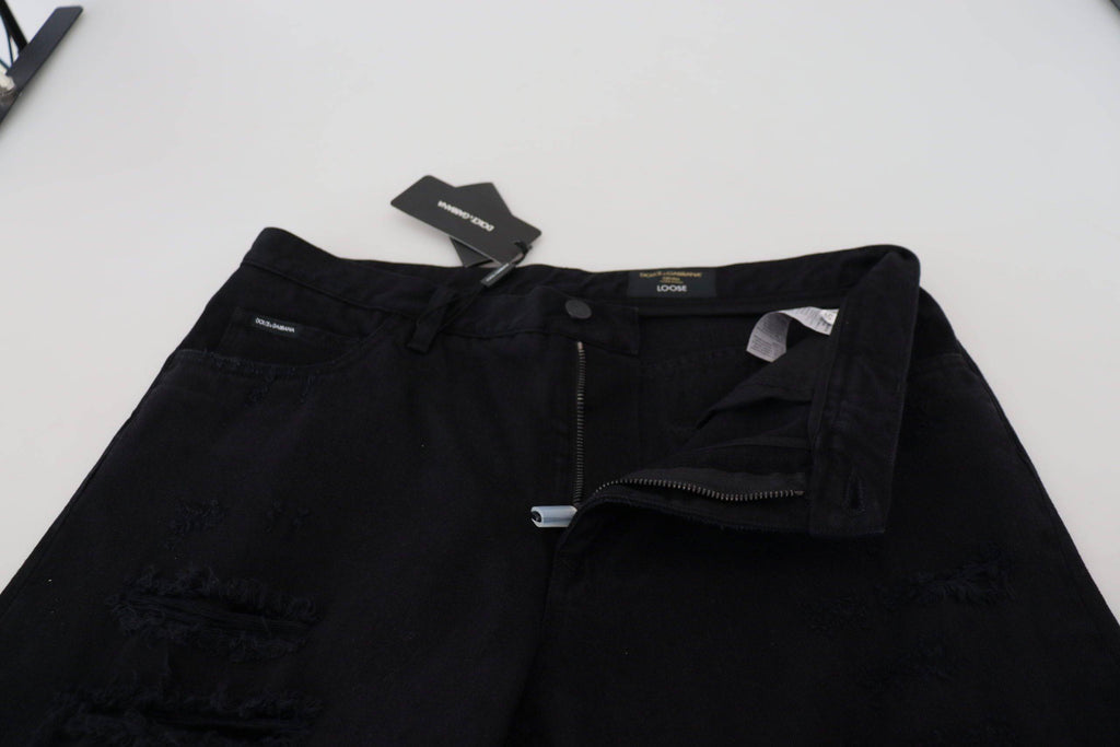 Jeans en coton noir décontractés et déchirés de Dolce & Gabbana, coupe régulière et ample, détails de style tendance.