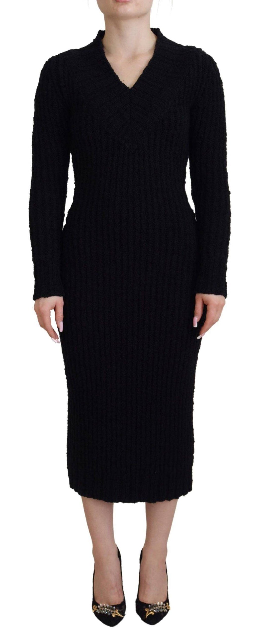 Robe pull en laine noire Dolce & Gabbana, coupe ajustée, manches longues et col rond, vêtement élégant et confortable.