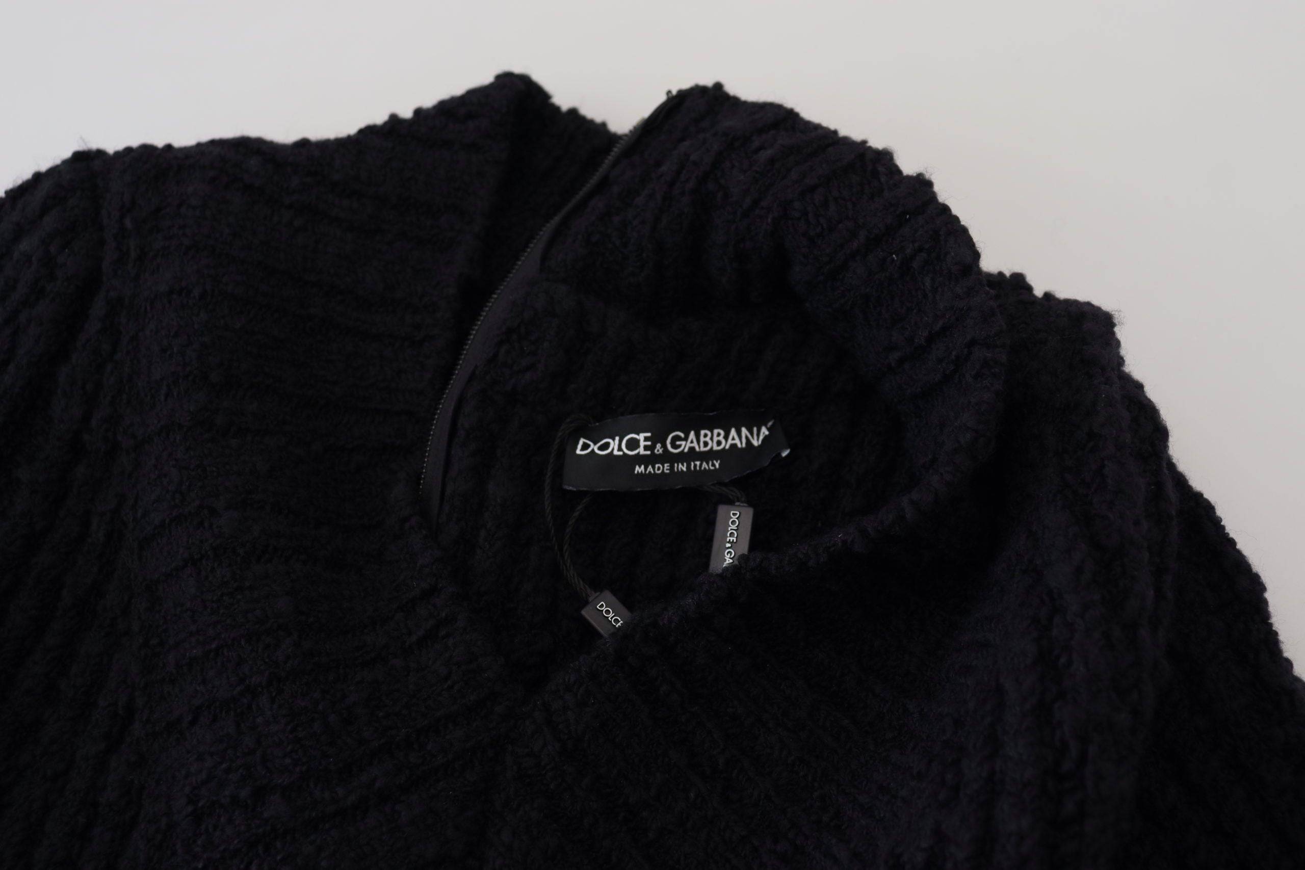 Robe pull en laine noire de Dolce & Gabbana, robe ajustée en tricot, élégante et confortable, vue de face.