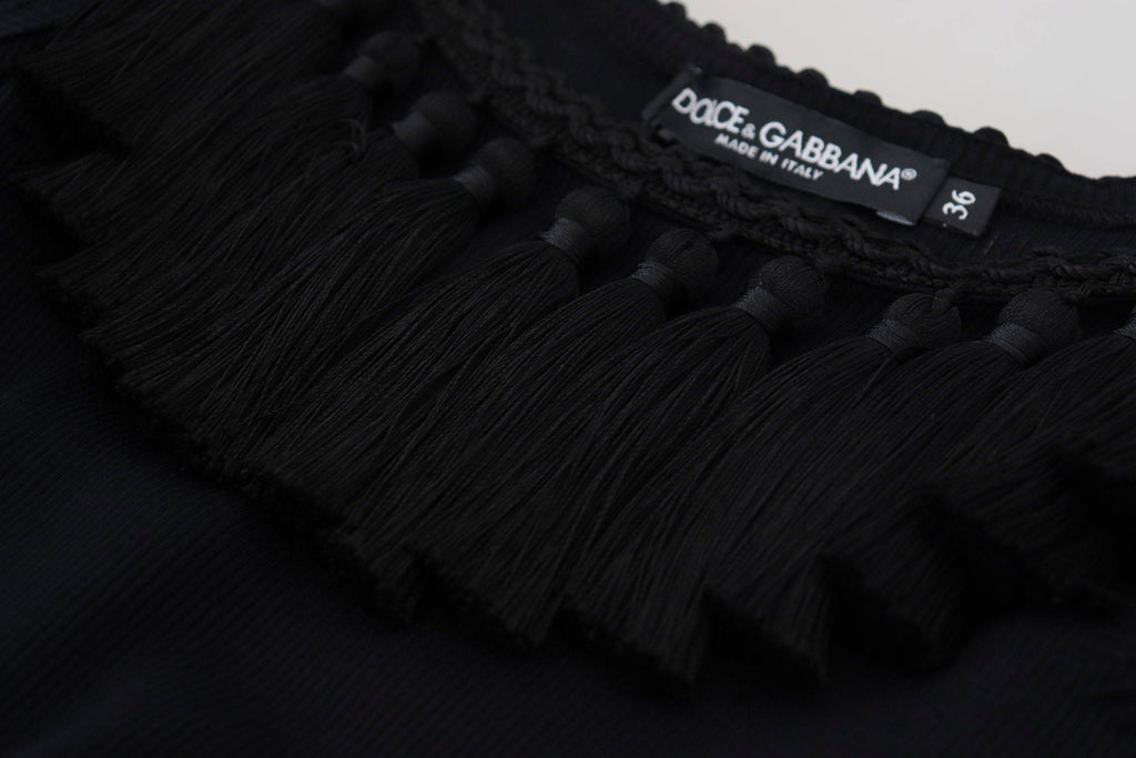 Haut débardeur noir Dolce & Gabbana en coton avec franges, décontracté et élégant, porté sur mannequin.