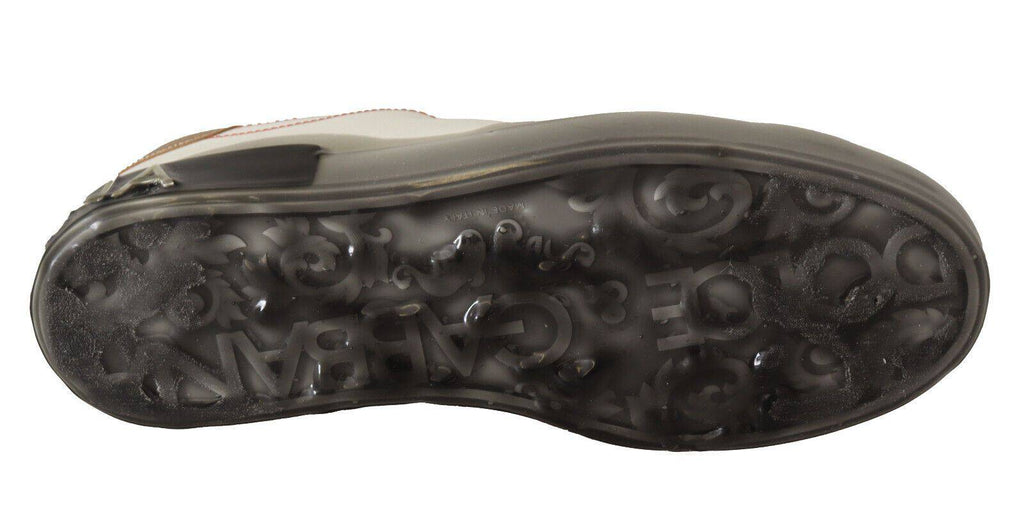 Chaussures basses Dolce & Gabbana en cuir blanc et or, sneakers décontractés pour homme, vue en gros plan
